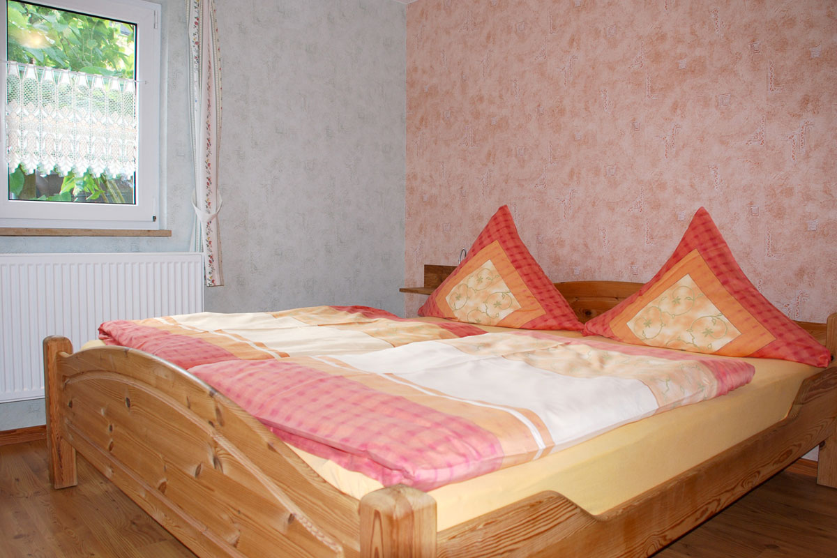 Brunnenhaus - Schlafzimmer mit Doppelbett